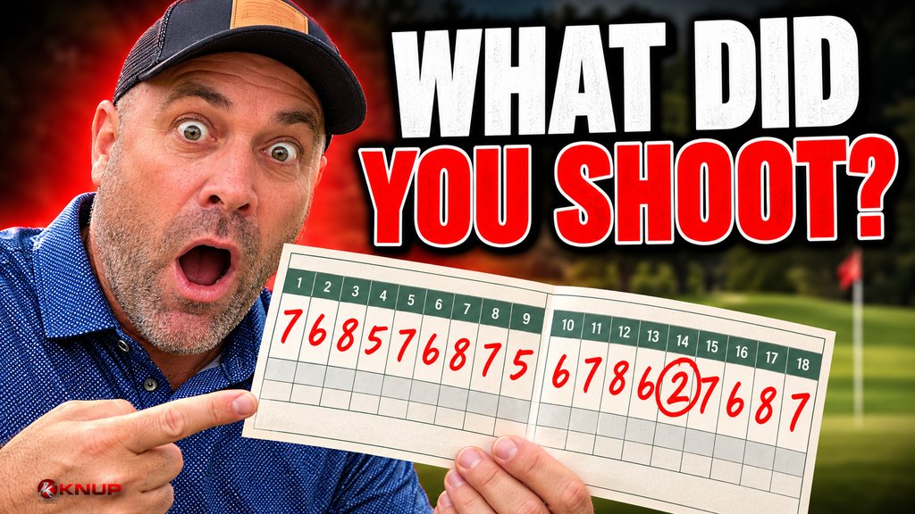 Shocked Knup holding up a giant golf scorecard covered in red numbers on a golf course, with bold red and black text reading WHAT DID YOU SHOOT?