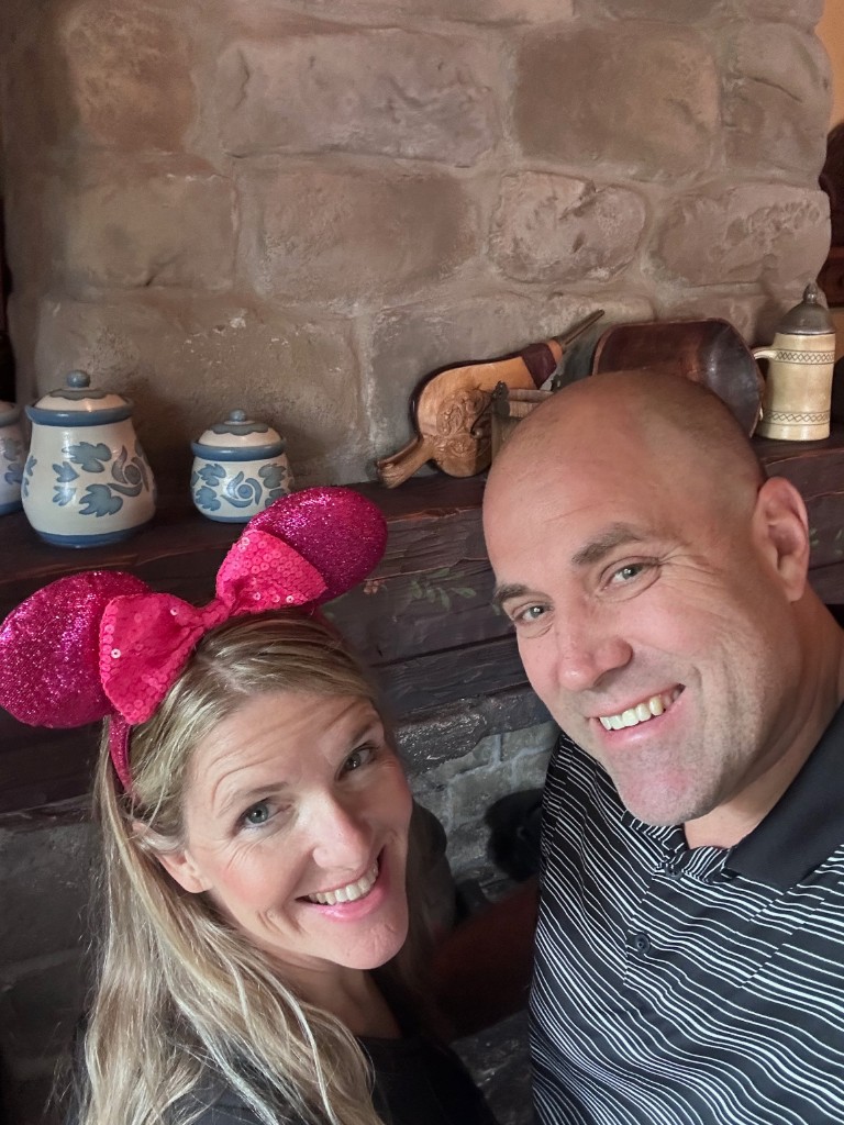 Ryan and Sarah selfie by the hearth at Enchanted Tales with Belle