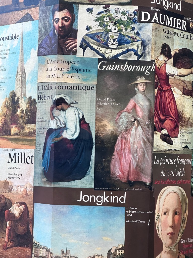 Close-up of French art exhibition posters near Impressions de France