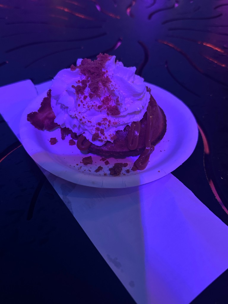 Belgium waffle with whipped cream and cookie crumble