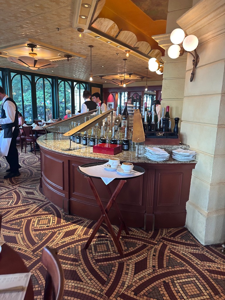 Service counter and mosaic floor inside Chefs de France