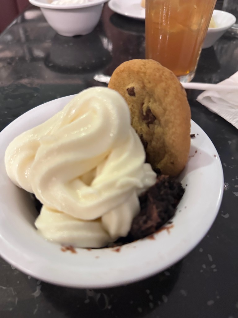 Brownie pudding with soft serve and a chocolate chip cookie