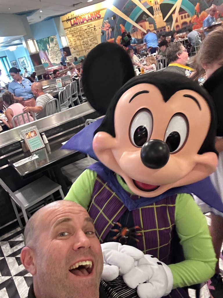 Ryan with Mickey Mouse in Halloween costume at Hollywood and Vine