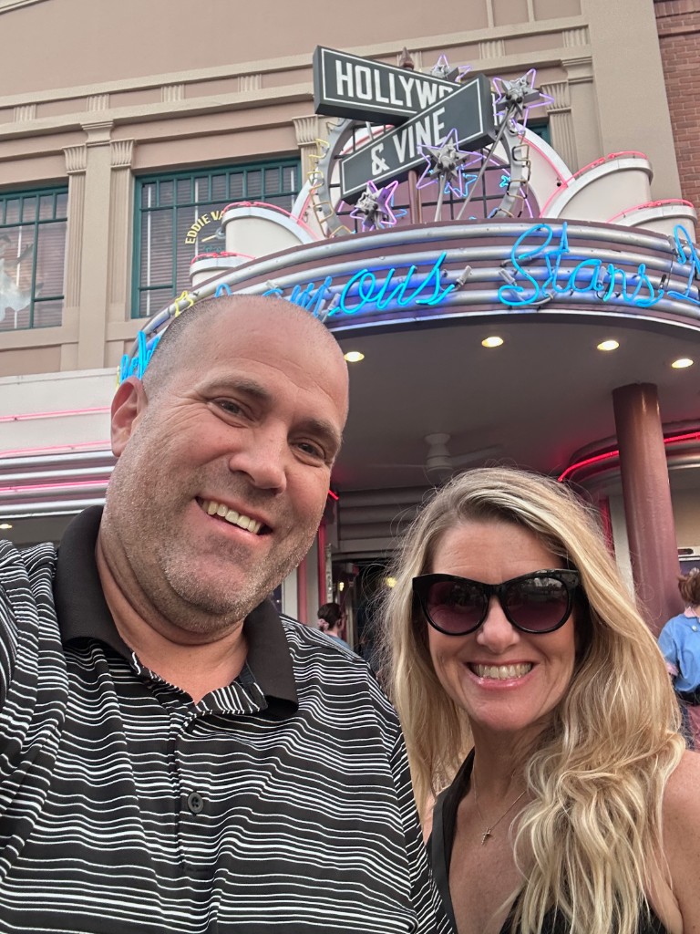 Ryan and Sarah outside the Hollywood and Vine marquee
