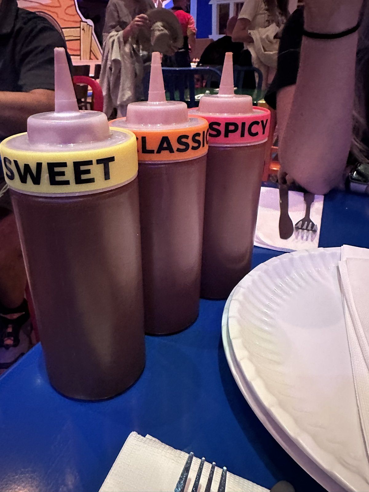 Sweet, Classic, and Spicy barbecue sauce bottles