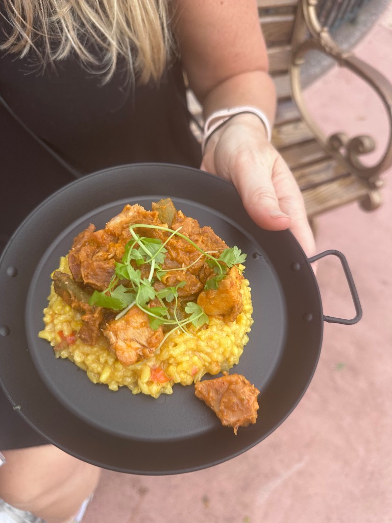 Spain paella with pork, chicken, and saffron rice