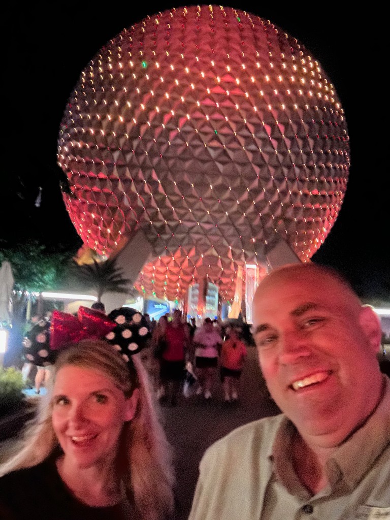 Walking out under Spaceship Earth at night