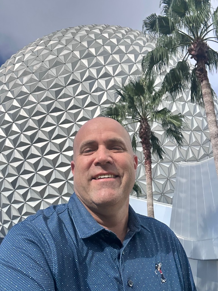 Ryan selfie with Spaceship Earth behind him