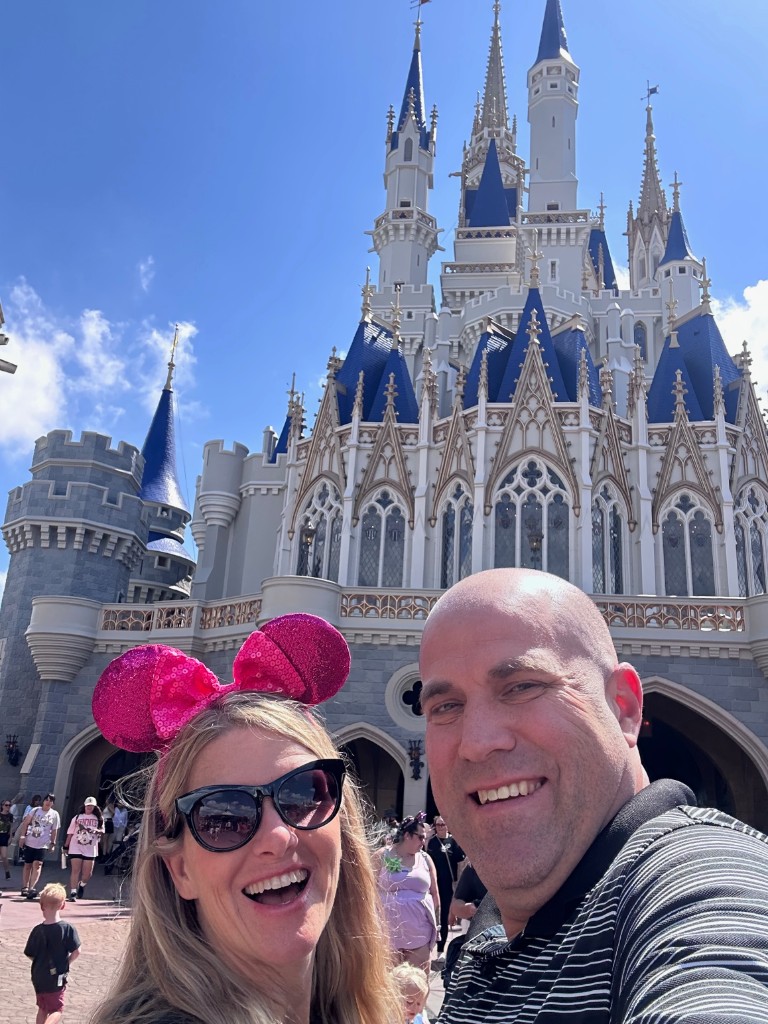 Ryan and Sarah selfie in front of Cinderella Castle on the way out
