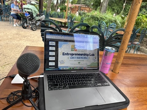 MacBook and ATR mic on a Pizzafari patio table for Ideal Homeschool class