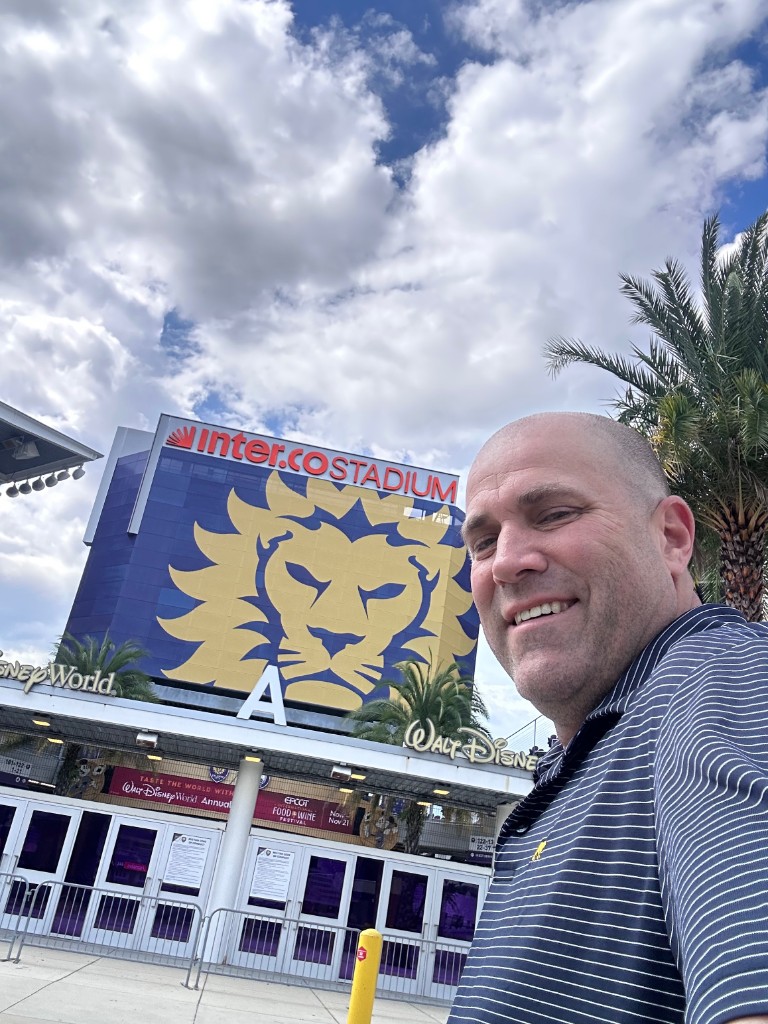 Ryan outside Inter&Co Stadium at the lion facade