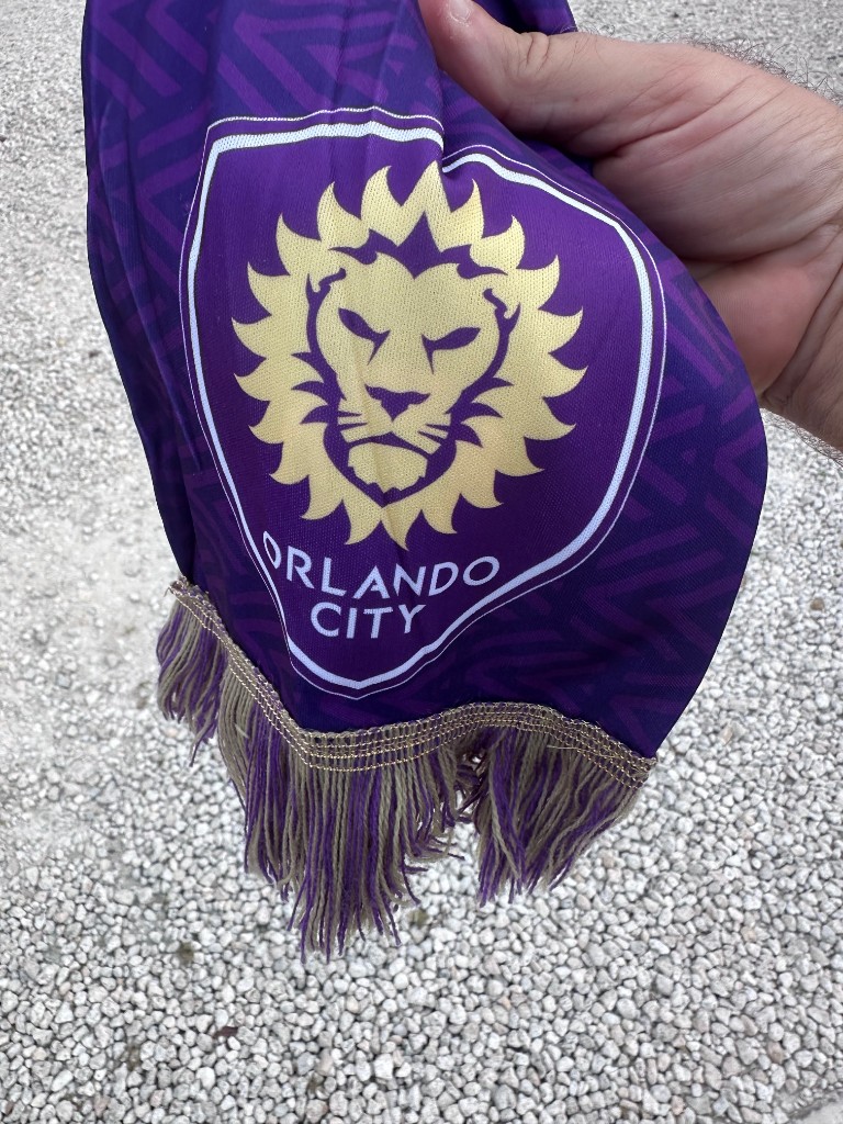 Purple Orlando City scarf with gold lion crest