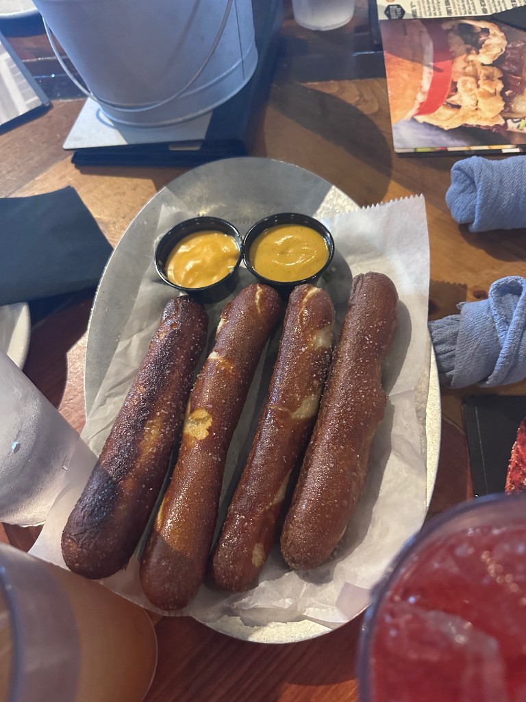 Salted pretzel sticks with cheese and mustard dips
