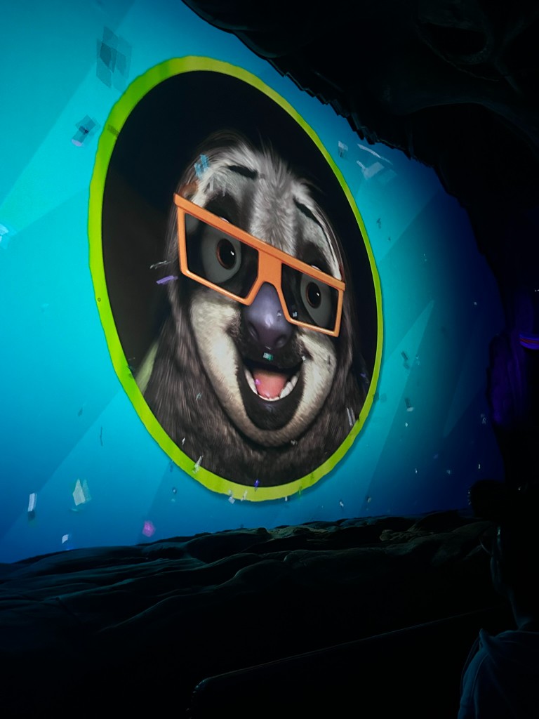 Flash the sloth on the pre-show screen