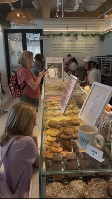 Gourmet cookie display case inside The Cookie Bar