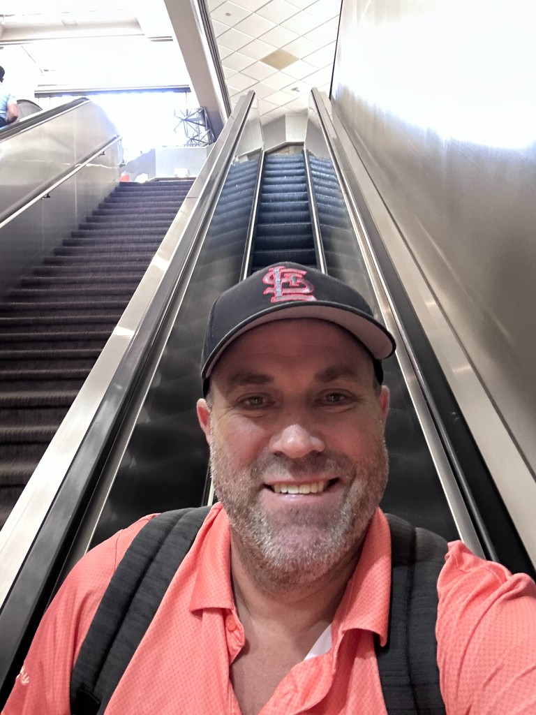 Ryan on the Contemporary Resort escalator up to the Grand Canyon Concourse