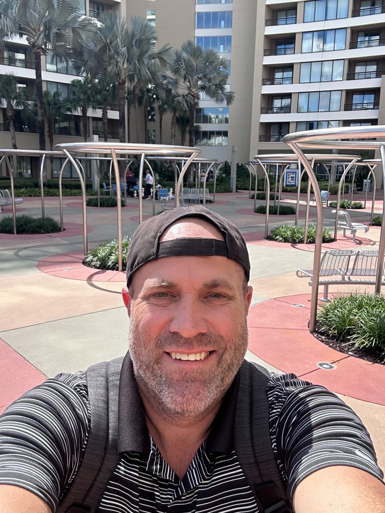 Ryan in the Contemporary Resort courtyard near Bay Lake Tower