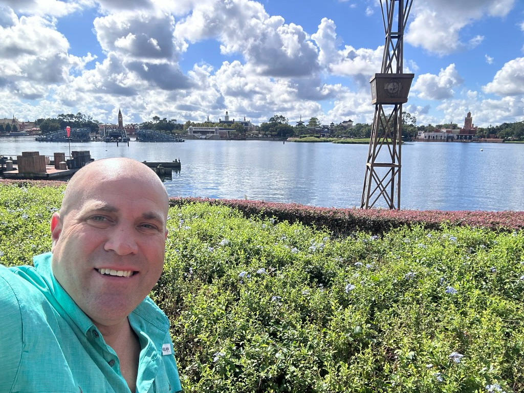 Ryan selfie across World Showcase Lagoon toward Japan and Morocco