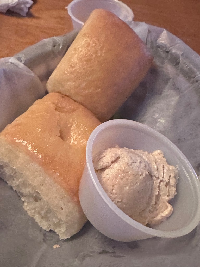 Warm rolls and cinnamon butter at Texas Roadhouse