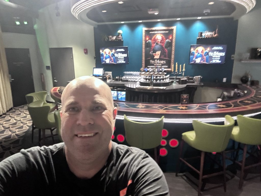 Ryan taking a selfie in front of the closed Roundtable bar with green stools